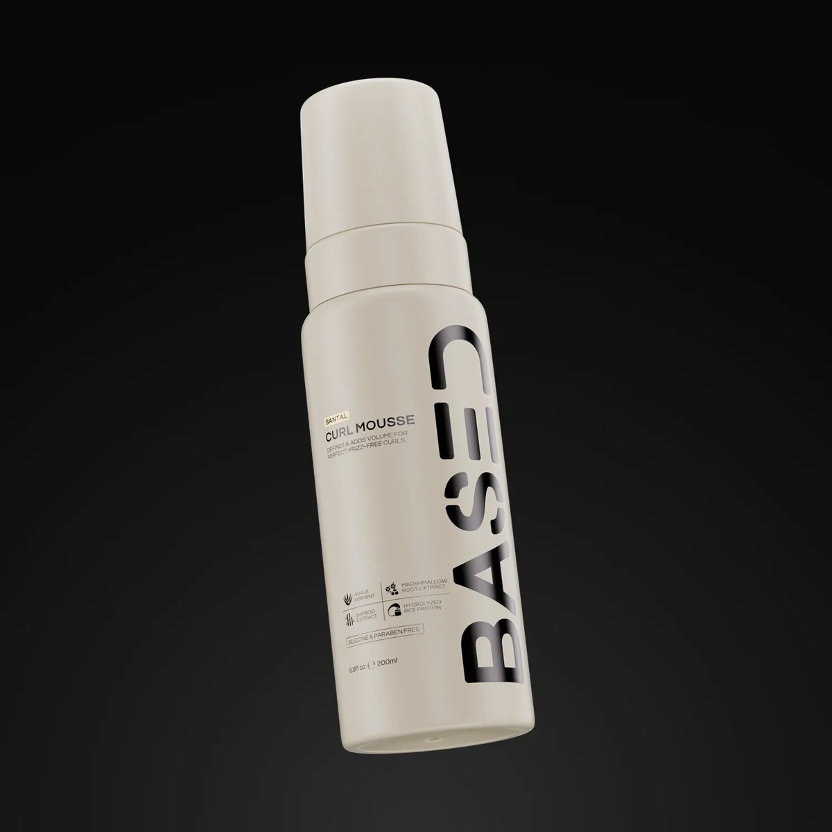 White mousse bottle labeled BASS on black background with cap on top